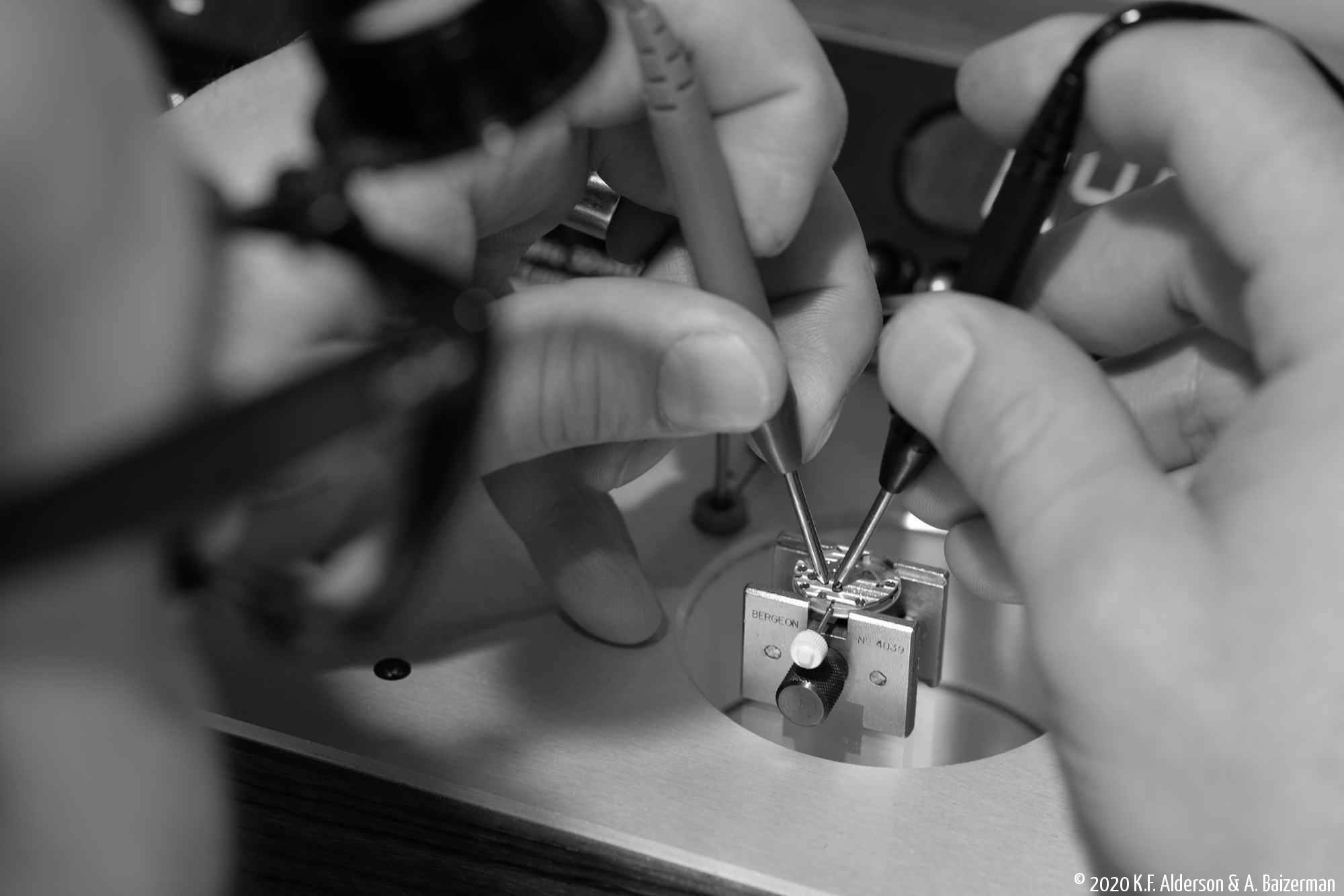 Watchmaker testing quartz watch